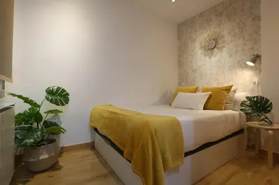 Cama o camas de una habitación en Atocha Art Apartment