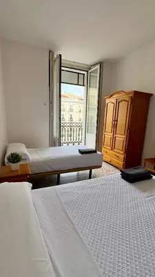 Cama o camas de una habitación en Hostal Ruano