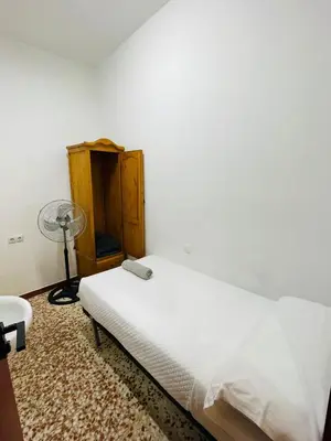 Cama o camas de una habitación en Hostal Ruano