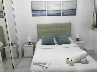 Cama o camas de una habitación en Apartamento en plaza callao Madrid