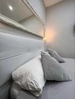 Cama o camas de una habitación en APARTAMENTO LAVAPIÉS - CENTRO MADRID