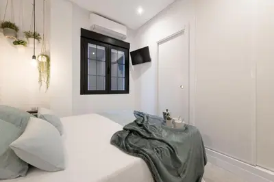 Cama o camas de una habitación en Cozy Apartment-1BED 1BATH- Barrio Salamanca