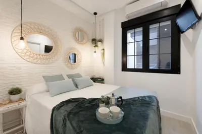 Cama o camas de una habitación en Cozy Apartment-1BED 1BATH- Barrio Salamanca