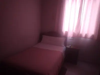 Cama o camas de una habitación en Hostal Gaudí