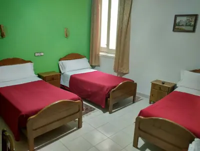 Cama o camas de una habitación en Hostal Gaudí