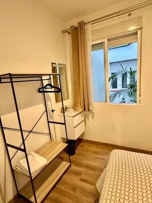 Cama o camas de una habitación en Hostal Fernández Atocha