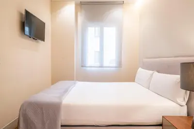 Cama o camas de una habitación en V73 Elegance & Comfort - Luxury in Barrio Salamanca