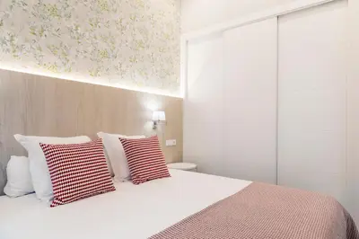 Cama o camas de una habitación en Feelathome San Marcos Apartments