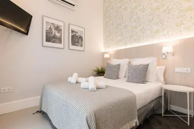 Cama o camas de una habitación en Feelathome San Marcos Apartments