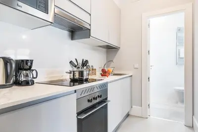 Una cocina o zona de cocina en Feelathome San Marcos Apartments