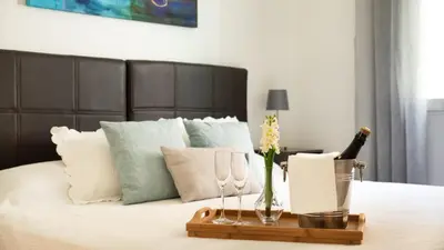 Cama o camas de una habitación en Heima Puerta del Sol - Opera Center
