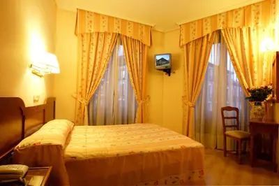 Cama o camas de una habitación en Hostal Silserranos