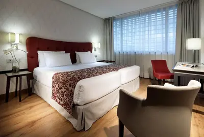 Cama o camas de una habitación en Eurostars Plaza Mayor