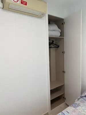 Cama o camas de una habitación en Hostal Retiro