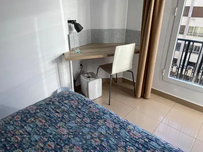 Cama o camas de una habitación en Hostal Retiro