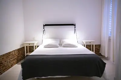 Cama o camas de una habitación en MEZZANINE YELLOW