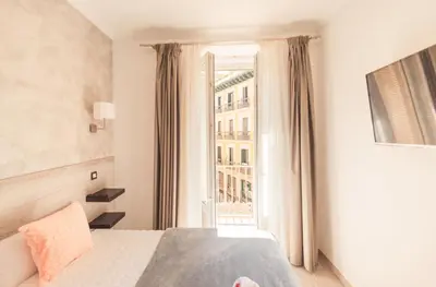 Cama o camas de una habitación en Hostal Pio Centro