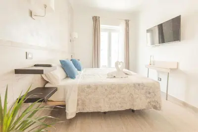 Cama o camas de una habitación en Hostal Pio Centro