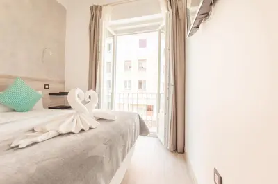 Cama o camas de una habitación en Hostal Pio Centro