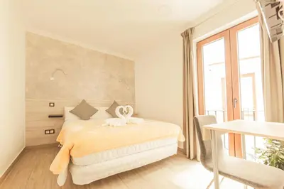 Cama o camas de una habitación en Atocha28
