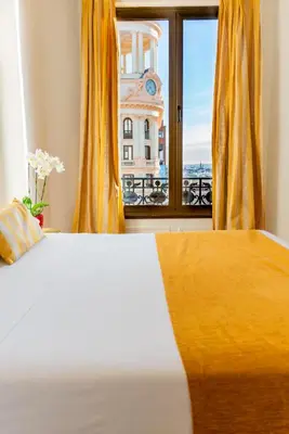 Cama o camas de una habitación en Hostal Josefina-Gran Vía