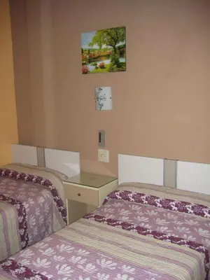 Cama o camas de una habitación en Hostal La Selecta