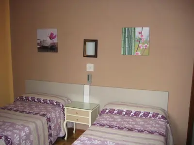 Cama o camas de una habitación en Hostal La Selecta