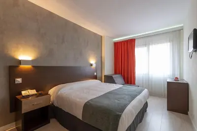 Cama o camas de una habitación en Apartamentos Recoletos