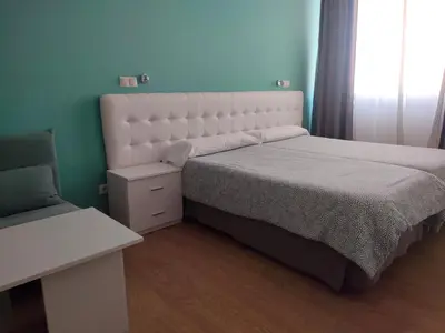 Cama o camas de una habitación en Boutique Urban Madrid Serrano