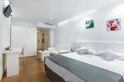 Cama o camas de una habitación en Boutique Urban Madrid Génova