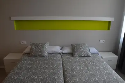 Cama o camas de una habitación en Boutique Urban Madrid Génova
