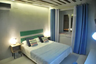 Cama o camas de una habitación en Apartamento NAO MALASAÑA - GRAN VIA