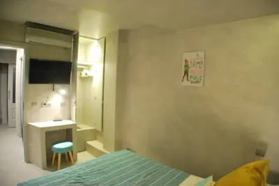 Cama o camas de una habitación en Apartamento NAO MALASAÑA - GRAN VIA