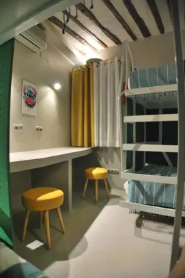 Cama o camas de una habitación en Apartamento NAO MALASAÑA - GRAN VIA