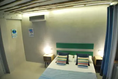 Cama o camas de una habitación en Apartamento NAO MALASAÑA - GRAN VIA