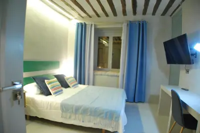 Cama o camas de una habitación en Apartamento NAO MALASAÑA - GRAN VIA