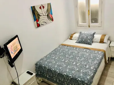 Cama o camas de una habitación en Beautiful and comfortable flat in center of Madrid