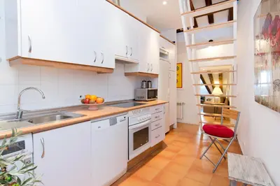 Una cocina o zona de cocina en Duplex Plaza Santa Ana
