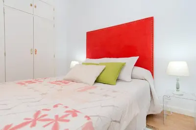Cama o camas de una habitación en Duplex Plaza Santa Ana