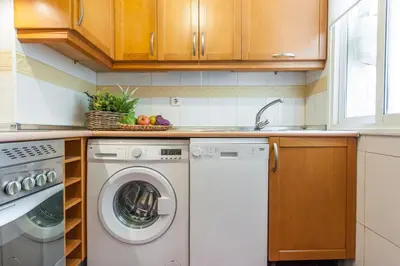 Una cocina o zona de cocina en Guernica - Estilo y Ubicación Perfecta en Embajadores