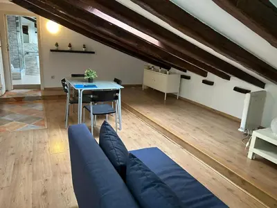 Zona de estar de Comodo atico en Tirso de Molina Madrid