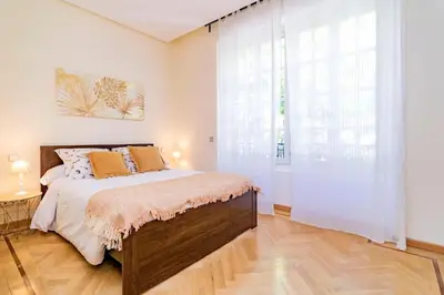 Cama o camas de una habitación en Velazquez Suites