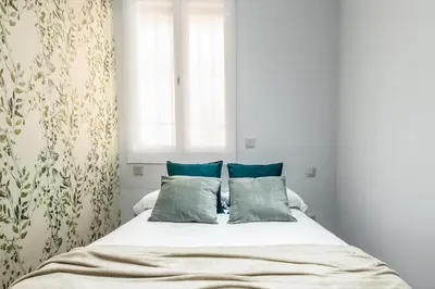 Cama o camas de una habitación en Waou Plaza de España II - Alquiler Corta Duración