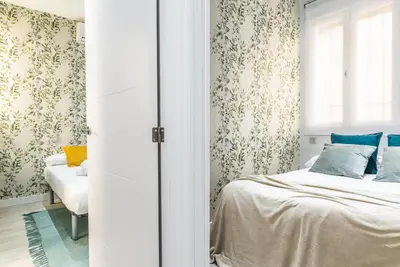 Cama o camas de una habitación en Waou Plaza de España II - Alquiler Corta Duración