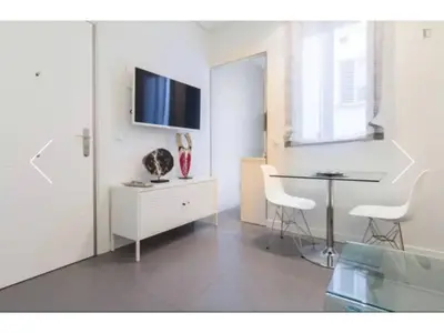 Una televisión o centro de entretenimiento en Apartamento Anton Martin II