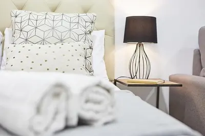 Cama o camas de una habitación en LEEWAYS LOFT XXI in GRAN VÍA