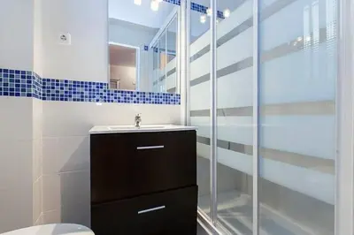 Un baño de Centro Madrid Rio - Monederos C