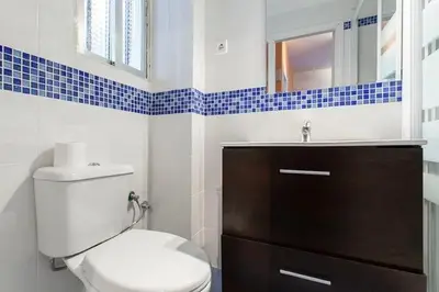 Un baño de Centro Madrid Rio - Monederos C