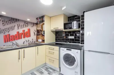 Una cocina o zona de cocina en Luna Apartment