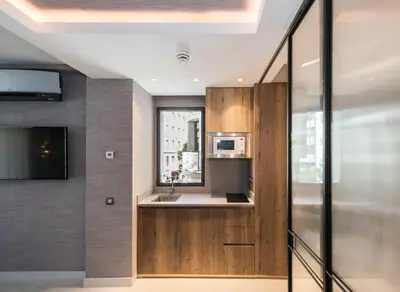 Una cocina o zona de cocina en The Garden Suites